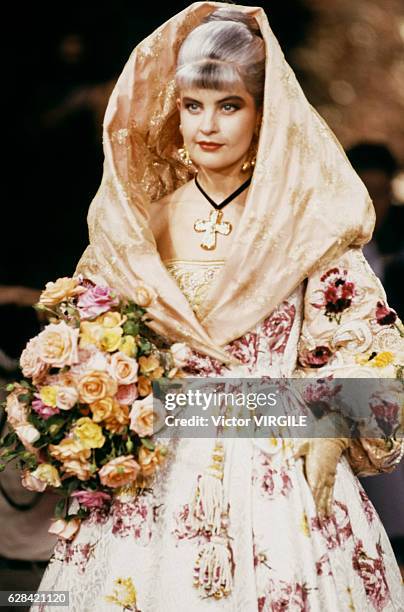 Marie Seznec walks the runway at the Christian Lacroix Haute Couture Fall/Winter 1989-1990 fashion show during the Paris Fashion Week in July, 1989...