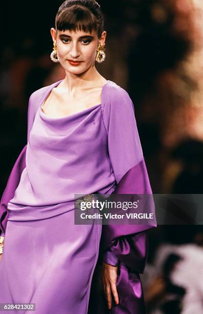 Model walks the runway at the Christian Lacroix Haute Couture Fall/Winter 1989-1990 fashion show during the Paris Fashion Week in July, 1989 in...