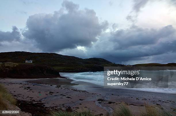 wintry ocean at achmelvich - achmelvich stock pictures, royalty-free photos & images