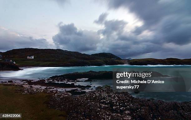 wintry ocean at achmelvich - achmelvich stock pictures, royalty-free photos & images