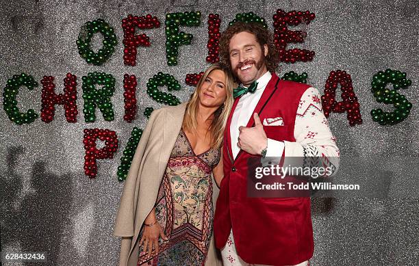 Jennifer Aniston and T. J. Miller attend the Premiere of Paramount Pictures' "Office Christmas Party" at Regency Village Theatre on December 7, 2016...