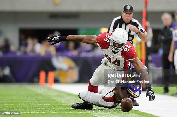 Captain Munnerlyn of the Minnesota Vikings breaks up a pass intended for Jermaine Gresham of the Arizona Cardinals during the game on November 20,...