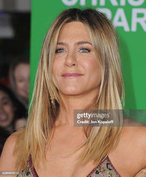 Actress Jennifer Aniston arrives at the Los Angeles Premiere "Office Christmas Party" at Regency Village Theatre on December 7, 2016 in Westwood,...
