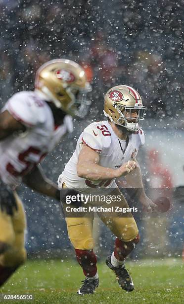 Nick Bellore of the San Francisco 49ers defends during the game against the Chicago Bears at Soldier Field on December 4, 2016 in Chicago, Illinois....