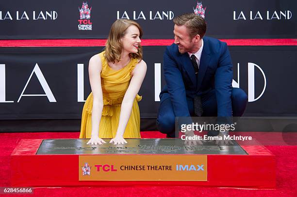 Actors Emma Stone and Ryan Gosling attend 'Ryan Gosling and Emma Stone hand and footprint ceremony' at TCL Chinese Theatre IMAX on December 7, 2016...