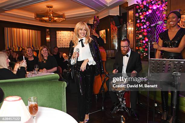 Kylie Minogue performs at an intimate performance at The Ivy to kick off The Ivy 100 Centenary celebrations on December 7, 2016 in London, England.