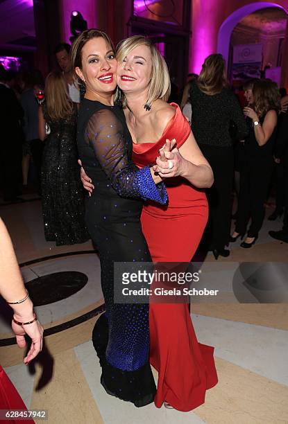 Julia Dahmen and Saskia Valencia dance during the 10th Audi Generation Award 2016 at Hotel Bayerischer Hof on December 7, 2016 in Munich, Germany.