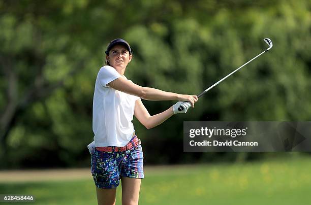 Florentyna Parker of England plays her second shot on the ninth hole during the completion of the first round of the 2016 Omega Dubai Ladies Masters...