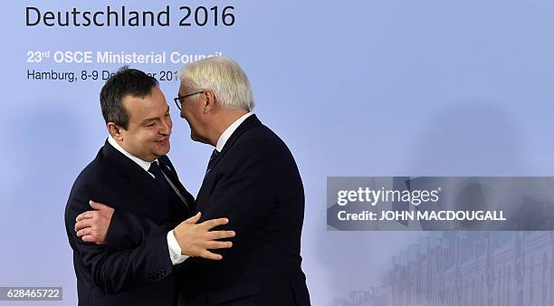 German Foreign Minister Frank-Walter Steinmeier greets Serbia's Foreign Minister Ivica Dacic at the start of a two-day foreign ministers' meeting of...