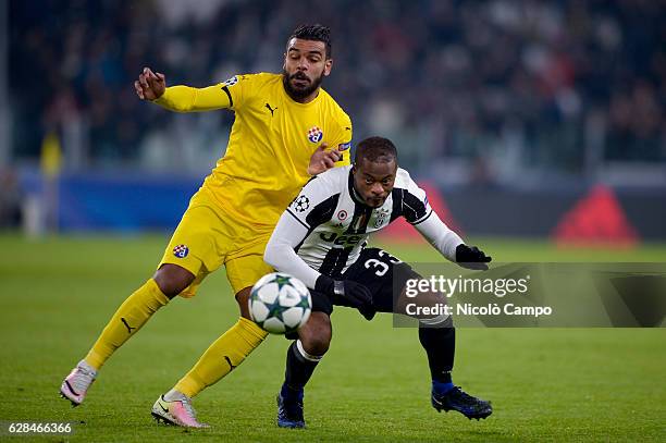 El Arabi Hillel Soudani of GNK Dinamo Zagreb and Patrice Evra of Juventus FC compete for the ball during the UEFA Champions League Group H football...