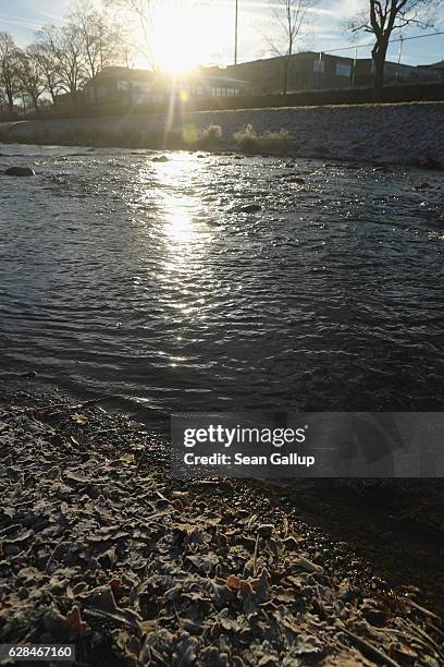 The sun rises over the Dreisam river near the spot where Maria L., a 19-year-old medical student, was raped and murdered and her body dumped in the...