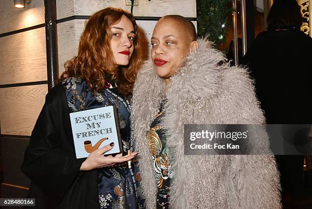 Yaz Bukey and Angie Rubini attend Liza Liwan Exhibition Cocktail at Liza Restaurant on December 7, 2016 in Paris, France.