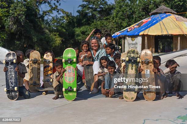 German community activist and author Ulrike Reinhard with village children at Skating park, popularly known as Janwaar Castle on October 26, 2016 in...