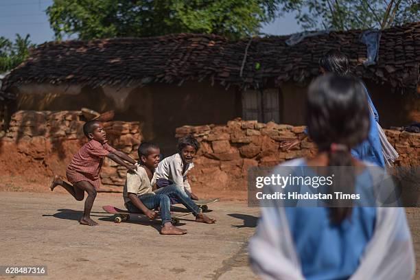 The kids are so attached to their skateboards that even ride on whatever level roads they can find in the village on October 26, 2016 in Janwaar,...