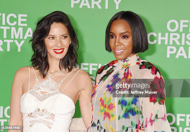 Actress Olivia Munn and singer-songwriter-actress Kelly Rowland arrive at the Premiere Of Paramount Pictures' 'Office Christmas Party' at Regency...