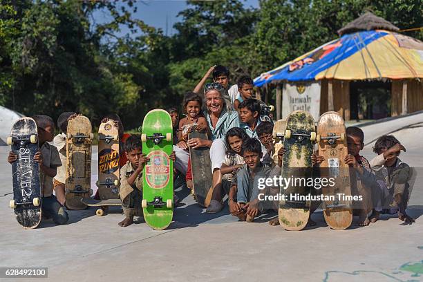 German community activist and author Ulrike Reinhard with village children at Skating Park, popularly known as Janwaar Castle, on October 26, 2016 in...