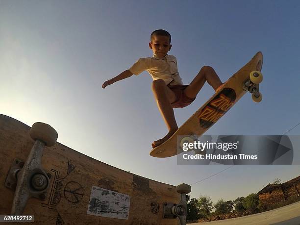 Eight-year-old Ankush skates boarding barefoot at Skating Park, popularly known as Janwaar Castle, on October 26, 2016 in Janwaar, India. In just six...