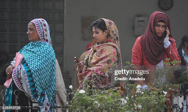 Relatives of the PIA plane crash victims gather at Pakistan Institute of Medical Sciences hospital to receive the bodies in Islamabad, Pakistan, on...