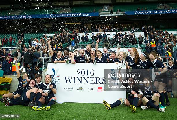 Oxford University women celebrate their 3-0 victory over Cambridge University Women at Twickenham Stadium on December 8, 2016 in London, England.