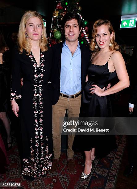 Alexa Hirschfeld, James Hirschfeld and Charlotte Dellal attend an intimate dinner to celebrate the launch of the Charlotte Olympia for Paperless Post...