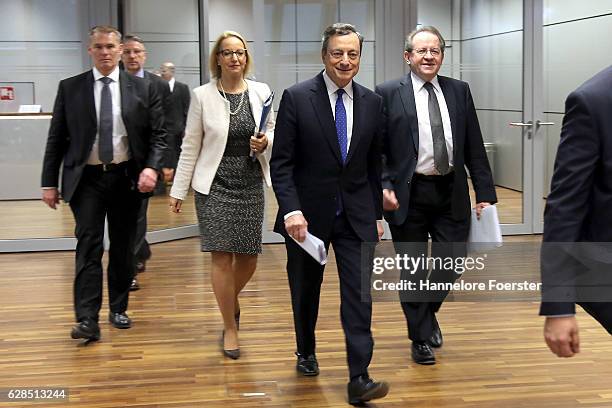 Mario Draghi, president of the European Central Bank, and Vice President Vitor Constancio arrive for a news conference at the ECB building on...