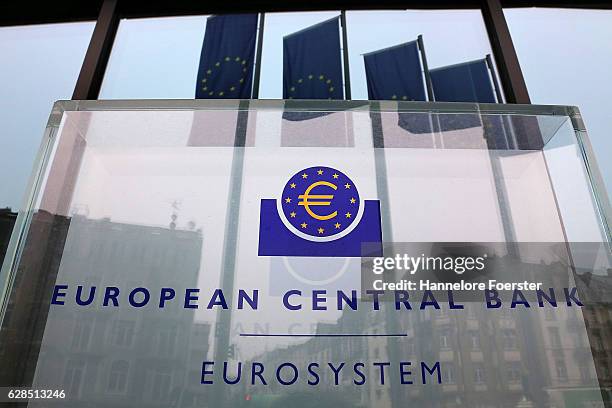 Flags are reflected in the front of the ECB building on December 8, 2016 in Frankfurt, Germany. The ECB today announced that it would continue its...