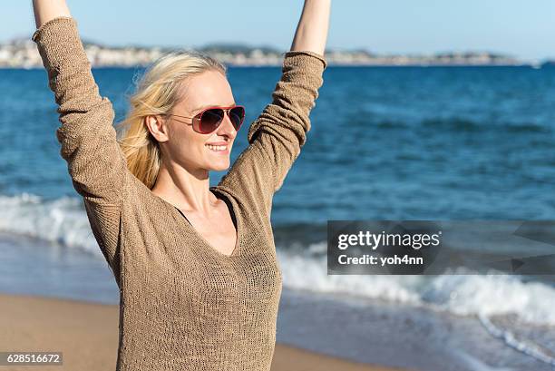 cute girl at beach - child nn model stock pictures, royalty-free photos & images