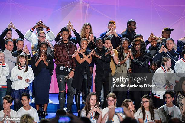 Clarisse Agbegnenou, Tony Yoka, Estelle Mossely, Elodie Clouvel, Cyrille Maret, Sofiane Oumiha, Teddy Riner, Emilie Andeol and French athletes during...