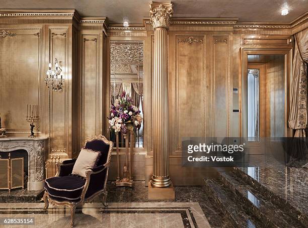 golden luxury living room in the private house - luxury mansion interior stock pictures, royalty-free photos & images