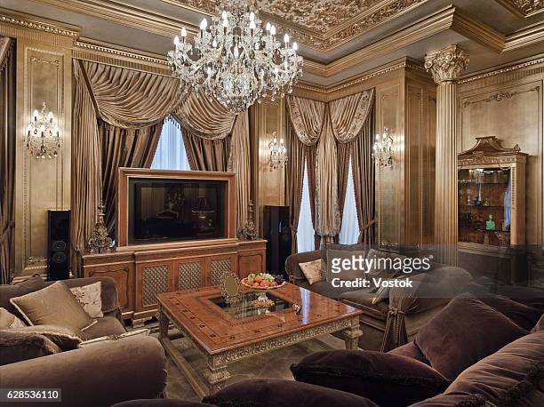 golden luxury living room in the private house - palace interior stockfoto's en -beelden