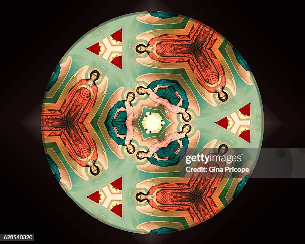 saint michael, round kaleidoscope on dark background. - kaleidoscope pattern stock illustrations