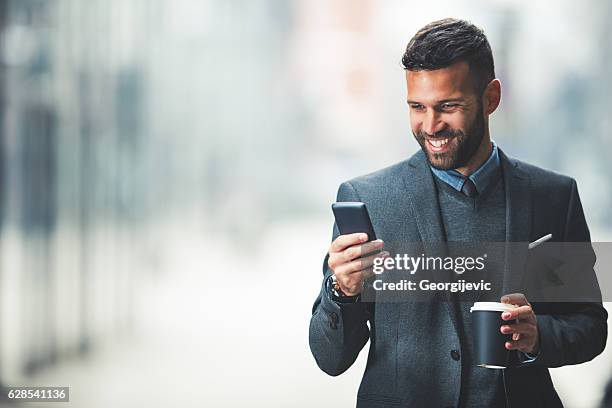 enjoying a break - business man mobile phone stock pictures, royalty-free photos & images