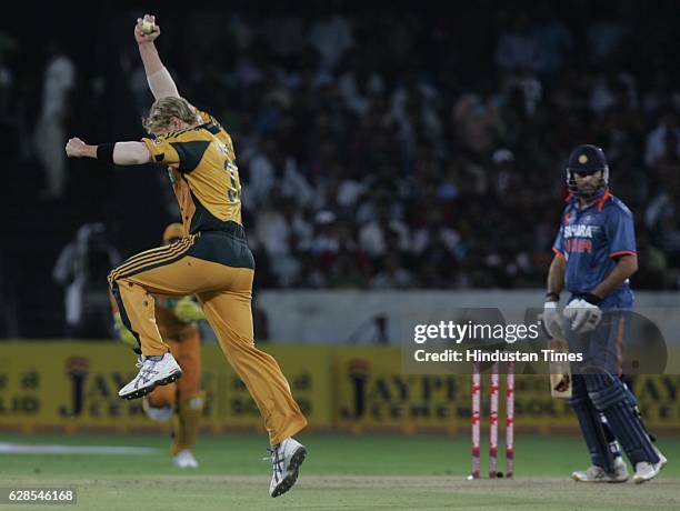 Australia bowler Shane Watson celebrates the wicket of INdia's Yuvra Singh during the 5th ODI between India and Australia at Rajiv Gandhi stadium,...