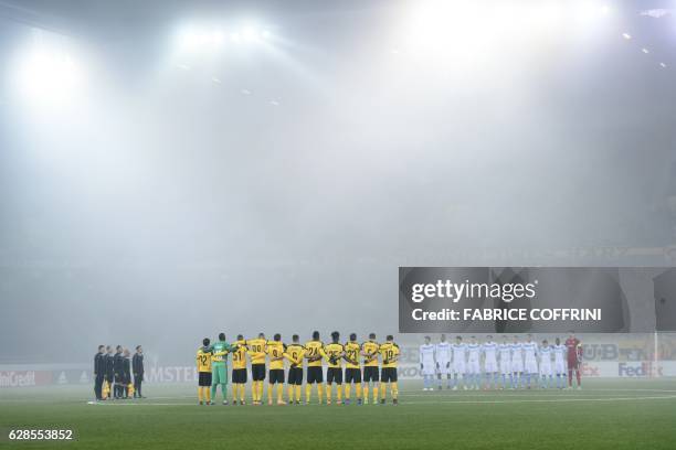 Astana's and Young Boys' players observe a minute of silence in memory of the football players of the Brazilian team Chapecoense, killed tragically...