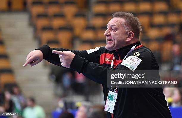 Germany's head coach Michael Biegler reacts during the Women's European Handball Championship Group B match between Germany and Poland in...