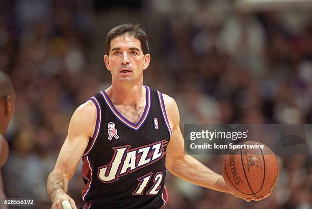 John Stockton of the Utah Jazz with the ball during a National Basketball Association game against the Los Angeles Lakers at the Staples Center in...