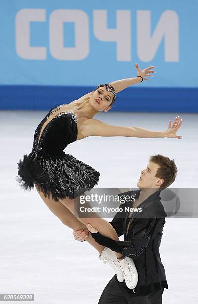 Russia - Elena Ilinykh and Nikita Katsalapov of Russia perform in the ice dance free dance at the Iceberg Skating Palace during the Winter Olympics...