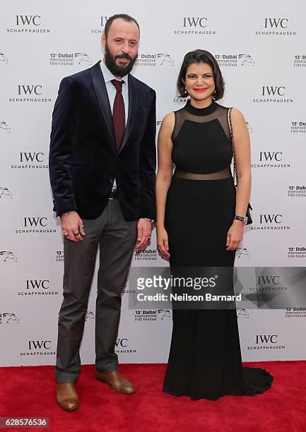 Ali Suliman and Managing Director of DIFF Shivani Pandya attend the IWC Filmmaker Award during day two of the 13th annual Dubai International Film...