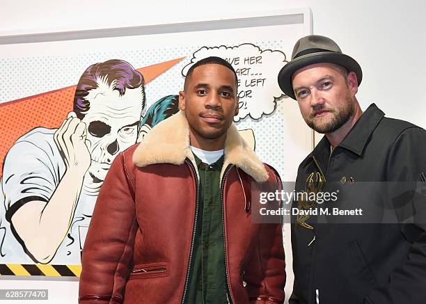 Reggie Yates and D*Face attend The Dean Collection X Bacardi Present No Commission: London on December 8, 2016 in London, England.