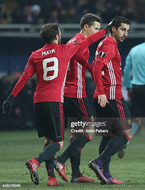 Henrikh Mkhitaryan of Manchester United celebrates scoring their first goal during the UEFA Europa League match between FC Zorya Luhansk and...