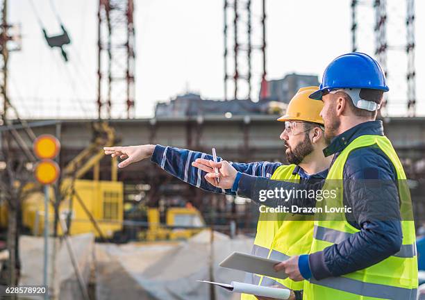 successful people working on common project - road construction stock pictures, royalty-free photos & images