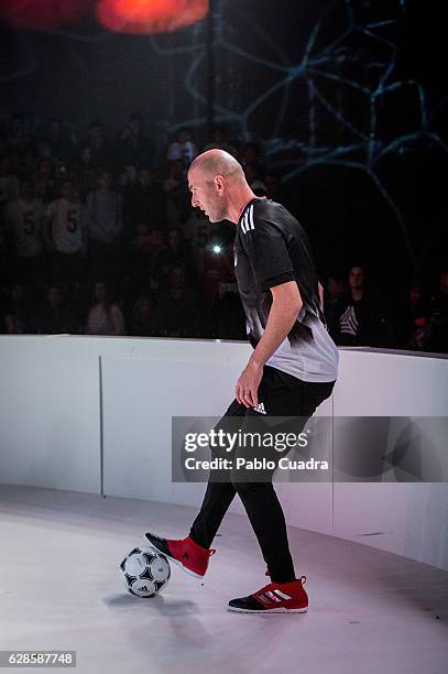 Real Madrid coach Zinedine Zidane presents the new ACE17 Red Limit Boots by Adidas on December 8, 2016 in Madrid, Spain.