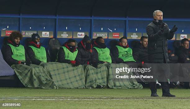 Manager Jose Mourinho of Manchester United watches from the dugout during the UEFA Europa League match between FC Zorya Luhansk and Manchester United...