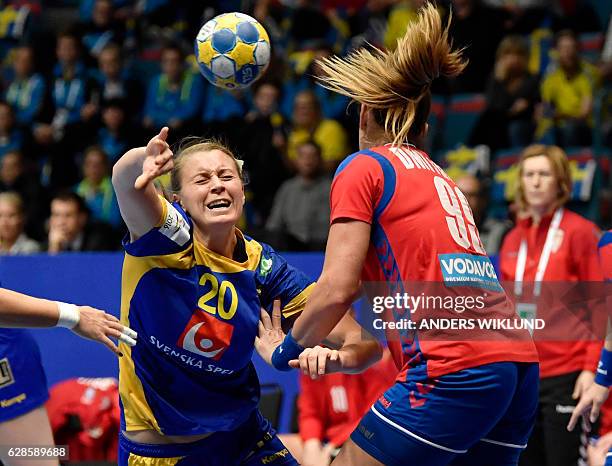 Sweden's Isabelle Gullden throws the ball during the Women's European Handball Championship Group A match Sweden v Serbia in Stockholm, Sweden on...