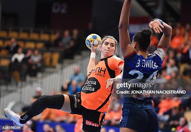 Netherlands' Estavana Polman prepares to throw the ball during the Women's European Handball Championship Group B match between Netherlands and...