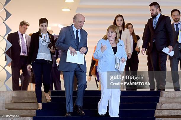Argentina's Foreign Minister Susana Malcorra and her Brazilian counterpart Jose Serra leave after a meeting at Itamaraty Palacein Brasilia on...