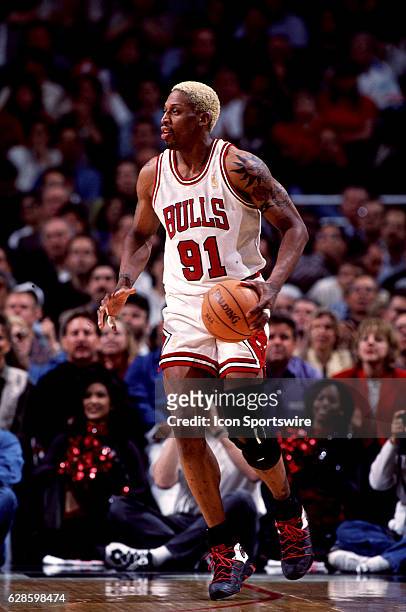 Dennis Rodman of the Chicago Bulls in action during the a Bulls game versus the Indiana Pacers at the United Center in Chicago, IL.