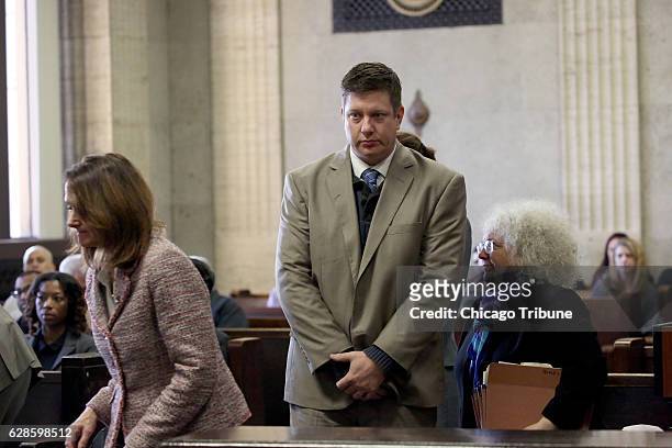 Former police officer Jason Van Dyke stands in front of Judge Vincent Gaughan at the Leighton Criminal Courts Building Thursday Dec. 8, 2016 in...