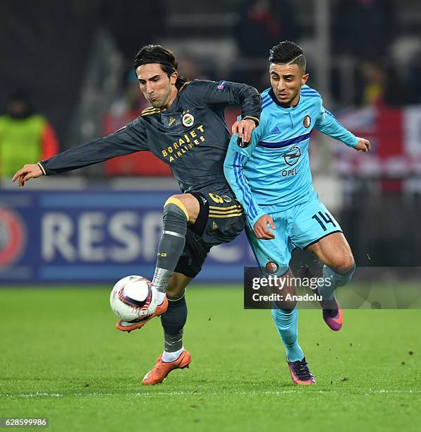 Hasan Ali Kaldirim of Fenerbahce in action against Bilal Baacikoglu of Feyenoord during the Europa League group A match between Feyenoord and...