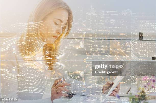 multiple exposure of city and financial woman - electronic form stock pictures, royalty-free photos & images